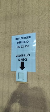 gumb za prižig reflektorjev